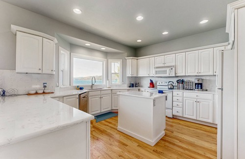 Coeur d'Alene House | Lakefront Home with a Private Dock, Fireplace, Dance Studio, & Mountain Views