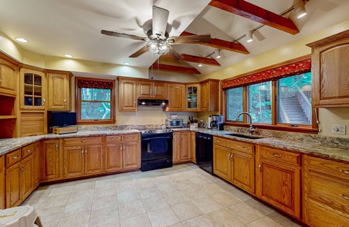 Raymond House | Lakefront home with amazing sunrise & sunset views, game tables & water toys