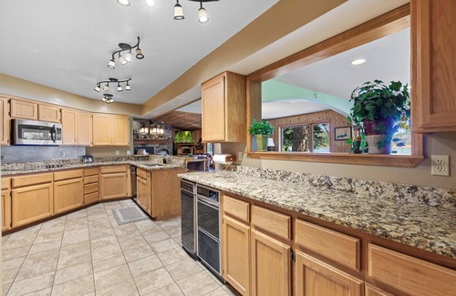 Spirit Lake House | Lakefront Home, with Beach, Dock, Pickleball court, 6 bed 5 bath on Spirit Lake