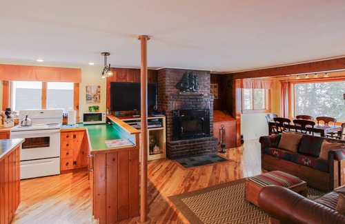 South Hero House | Lakefront Home with Patio Over the Lake, Private Dock, & Stunning Sunset Views