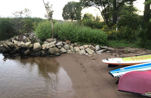 Escanaba House | Lakefront Home with Private Yard and Sandy Beach