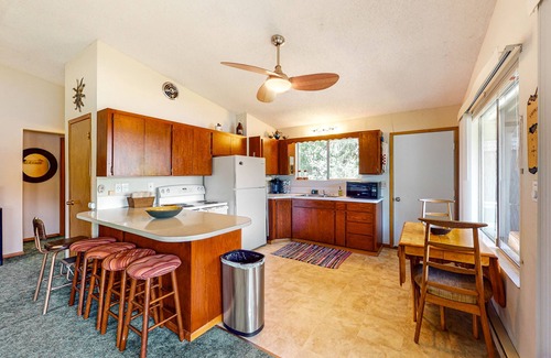 Rathdrum House | Lakefront home with private dock, large yard, wood stove, firepit, grill, W/D