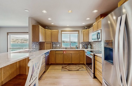 Manson House | Lakefront home with private hot tub, dock, kayaks, covered veranda & huge views