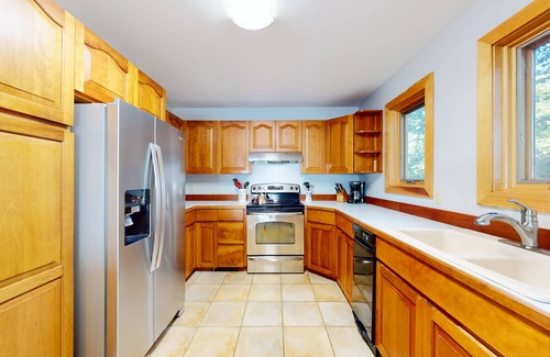 Malletts Bay House | Lakefront home with water access, views of the mountains, private deck & patio