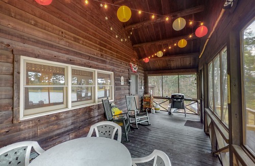 Mariaville Cabin | Lakefront home with stunning views, firepit, 2 canoes, fast WiFi & yard games