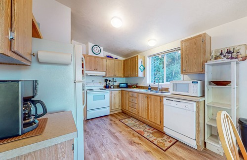 Lakeside House | Lakefront home with water/dune access, deck, grill, firepit, dock, & W/D