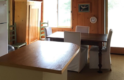 Middleton House | Lakefront house with outdoor shower, kayaks, firepit, deck, wifi, & grill