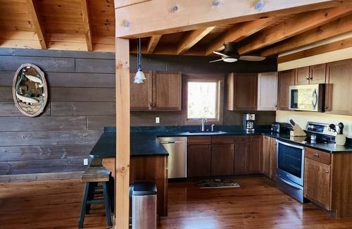 Butler Cabin | Lakefront Lullaby-Rustic cabin w/lake views, boatslip, hot tub & fiber internet