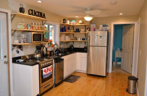 East Falmouth House | Lakefront, Private Dock, New Reno, Outdoor Shower, Firepit, Bocce court, etc.
