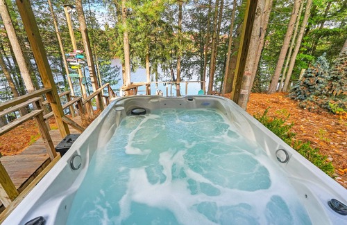 South Boardman House | Lakefront retreat 30 min to Traverse City. Hot tub, fire pit, kayaks, game room.