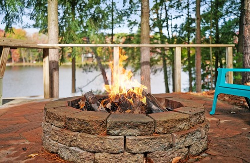 South Boardman House | Lakefront retreat 30 min to Traverse City. Hot tub, fire pit, kayaks, game room.