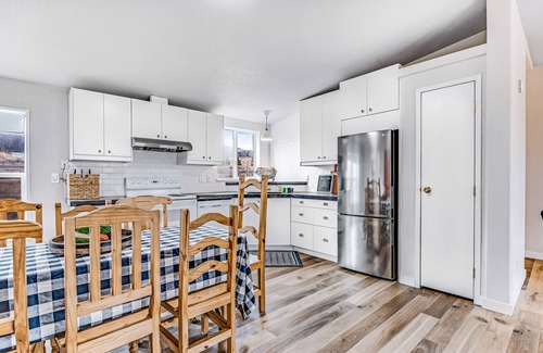 Fish Haven House | Lakefront retreat near town with spacious deck, free WiFi, beach access, & views