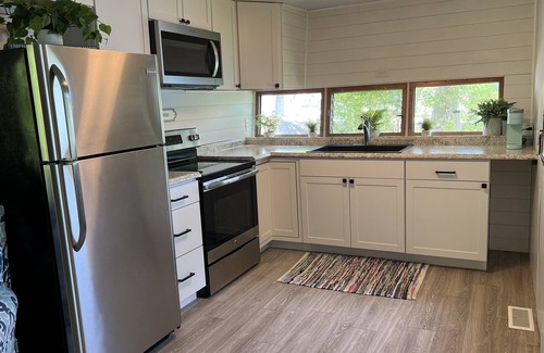 Traverse City Cottage | LAKEFRONT RETREAT WITH KAYAK AND PADDLE BOARDS, LONG LAKE, TRAVERSE CITY