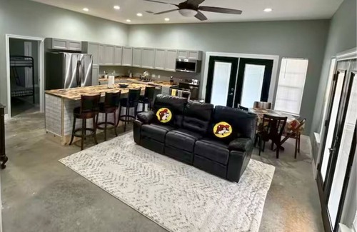 West Livingston House | Lakefront retreat with pickleball, boat launch, putting green, pool table & stunning lake views!