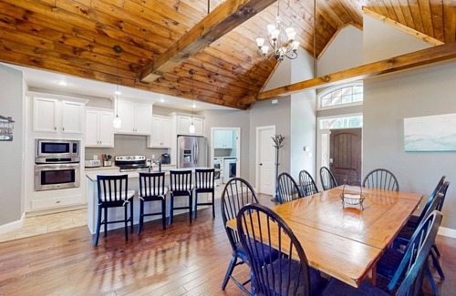 Lake Lure House | Lakefront retreat with private beach, games, dock & kayaks
