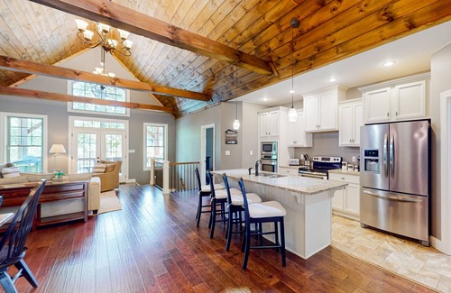 Lake Lure House | Lakefront retreat with private beach, games, dock & kayaks
