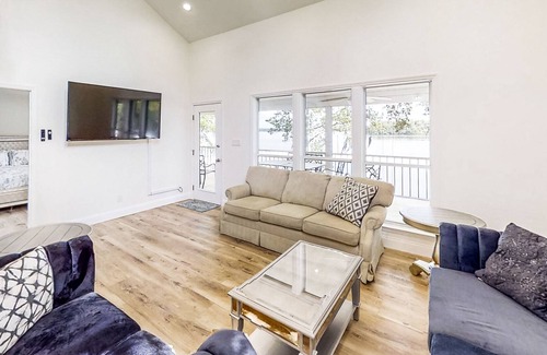 Telogia House | Lakefront stunner with large screened-in porch