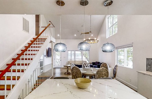Telogia House | Lakefront stunner with large screened-in porch