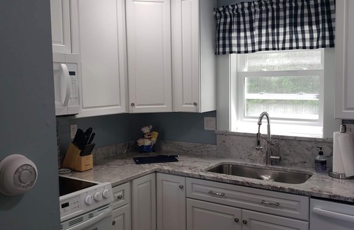 Ludlow House | Lakefront Vacation House w/quiet, sandy beach/boats -