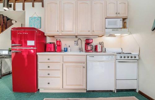 Gaylord Ski Chalet | Lakefront Vintage Chalet Surrounded by Lush Forest + Boats, Kayaks, Retro Games
