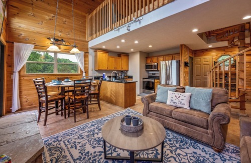 Sevierville Cabin | Lakefront with Dock! Hot Tub! Firepit! Pool Table! Mountain View! Pets!