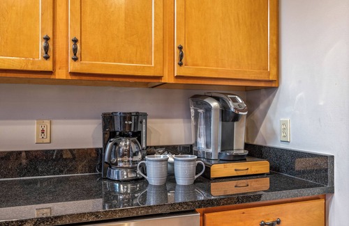 Sevierville Cabin | Lakefront with Dock! Hot Tub! Firepit! Pool Table! Mountain View! Pets!
