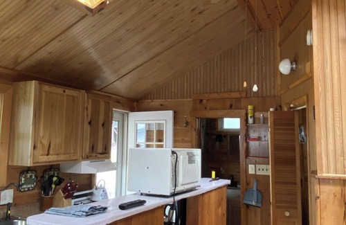 Naples Cottage | Lakeside 1 bedroom cottage sleeps up to 4. Perfect serenity in Naples. Wifi