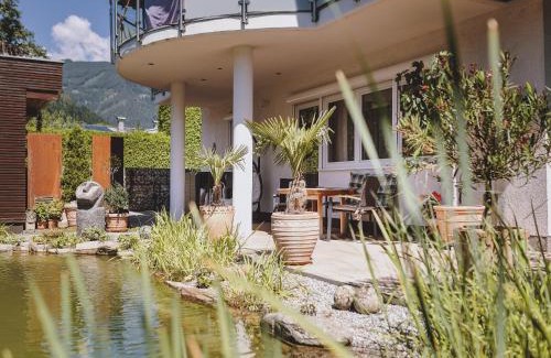 Schuttdorf Apartment | Lakeside Appartement Plattner by we rent, SUMMERCARD INCLUDED