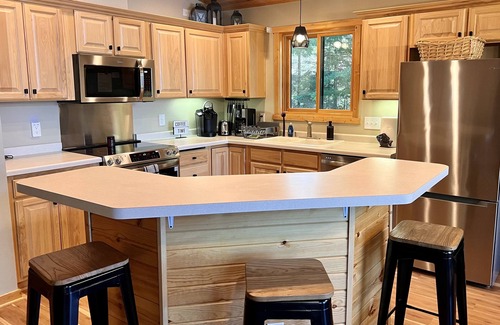 Hayward Cabin | Lakeside Cabin on 2,700 Acre Nelson Lake in Hayward - Fun for All Ages!