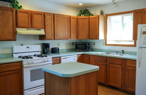Tomah House | Lakeside cabin with Hot Tub and full kitchen! Sleeps up to 12 people.