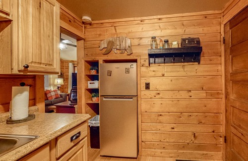 Three Lakes Cabin | Lakeside cabin with a firepit, sunroom, & seasonal dock
