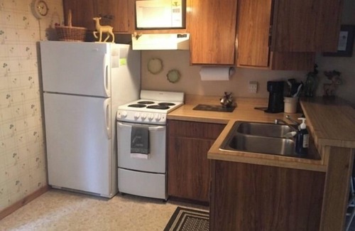 Oscoda House | Lakeside condo