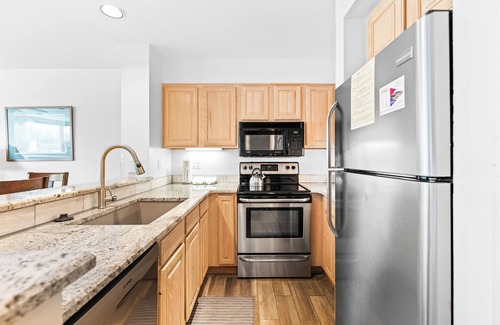 Lakeside Village Condo | Lakeside Condo w/Mountain & Lake Views, Steps to Shops, Dining & Activities!