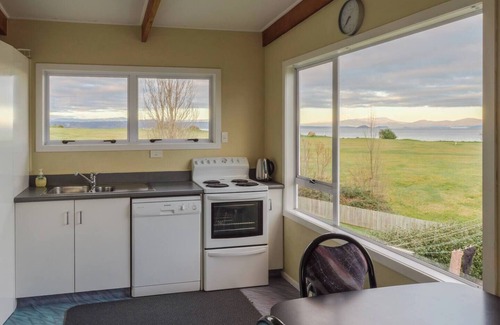 Wharewaka House | Lakeside Delight with Mountain Views