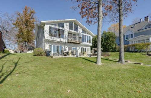 Sister Lakes House | Lakeside Michigan Retreat with Boat Dock and Fireplace