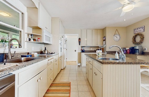 Alton Bay House | Lakeside paradise w/lakefront deck, enclosed porch, 2 docks & large lawn