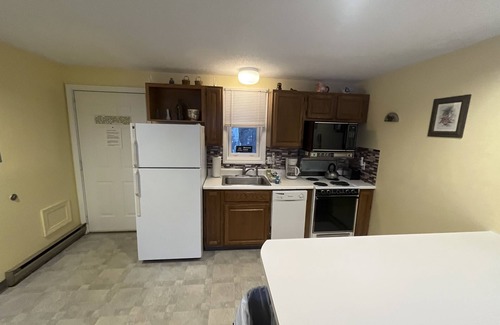 Gilford Condo | Lakeview condo with tennis, sauna, shared pool & a private beach