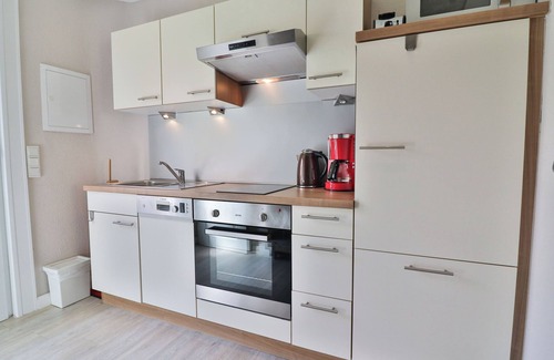 Langeoog Apartment | Langeooger Viermaster - Rotes Segel