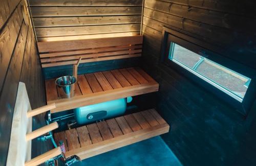 Kolari Ski Chalet | Lapland Riverside Cabin 5 MUSTIKKA, Ylläs, Tiny Home with Sauna, Fireplace, Terrace, BBQ, Wifi, Ski, Fishing, Pets OK