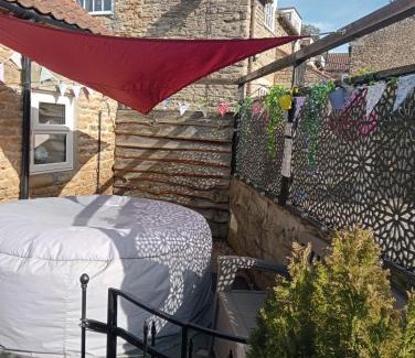 Wykeham House | Larch Cottage Ruston with hot tub, dogs go free