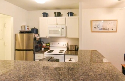 Caine Woods Condo | Large 2 Bedroom 2 bath condo featuring pool, tennis, WiFi, Picnic area w/grill