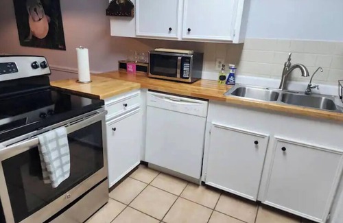 South Side House | Large 2 bedroom Townhome, Backyard, Covered Patio, Private covered parking.
