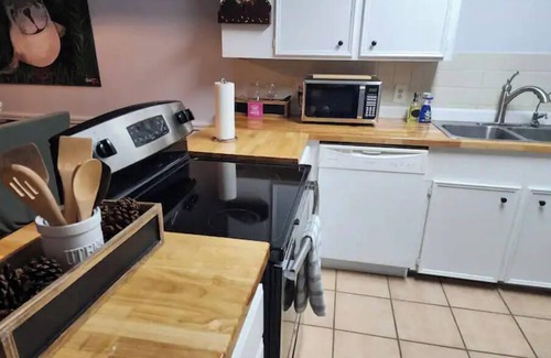South Side House | Large 2 bedroom Townhome, Backyard, Covered Patio, Private covered parking.