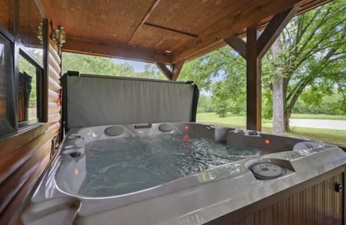 Golden Cabin | Large back porch with new hot tub, internet, pond, secluded, near glover river