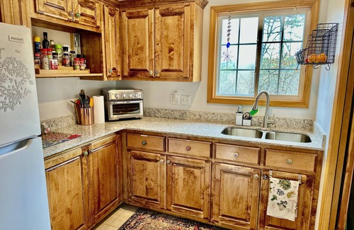Eureka Springs Cottage | Large deck, BBQ grill, fire pit & Arkansas Sunsets- the perfect spring evening!