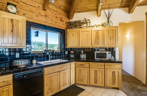 Pagosa Highlands Cabin | Large family-friendly cabin with game room, hot tub, & wraparound deck