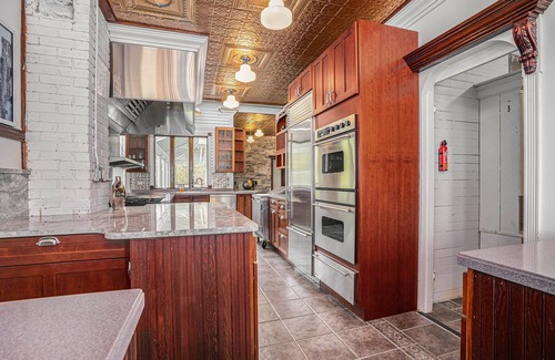 Fennville House | Large family friendly compound, heated pool, and Indoor Basketball court