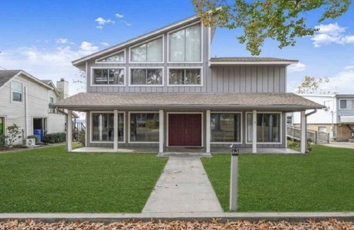 West Livingston House | Large Home With Boat Dock and Picture Perfect Sunsets Sleeps 14