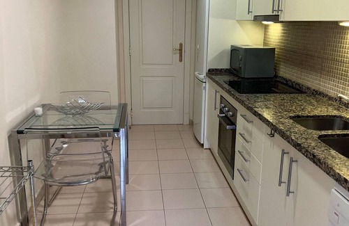 Benahavis Apartment | Large Luxury Apartment La Quinta Golf in tranquil garden & large pool FREE WIFI