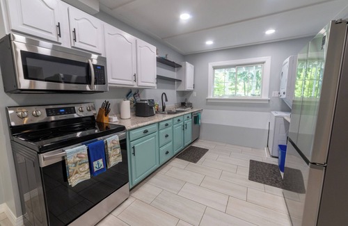 Ocean Park Apartment | Large Outdoor Space with Saltwater Hot Tub, Fire Pit, Gardens, and Deck in OOB!
